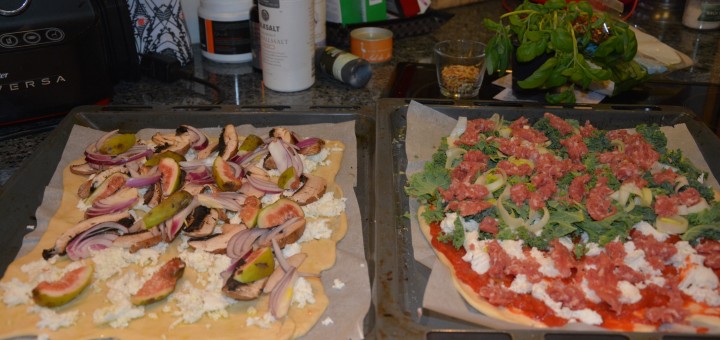 Premiumpizza på väg in i ugnen